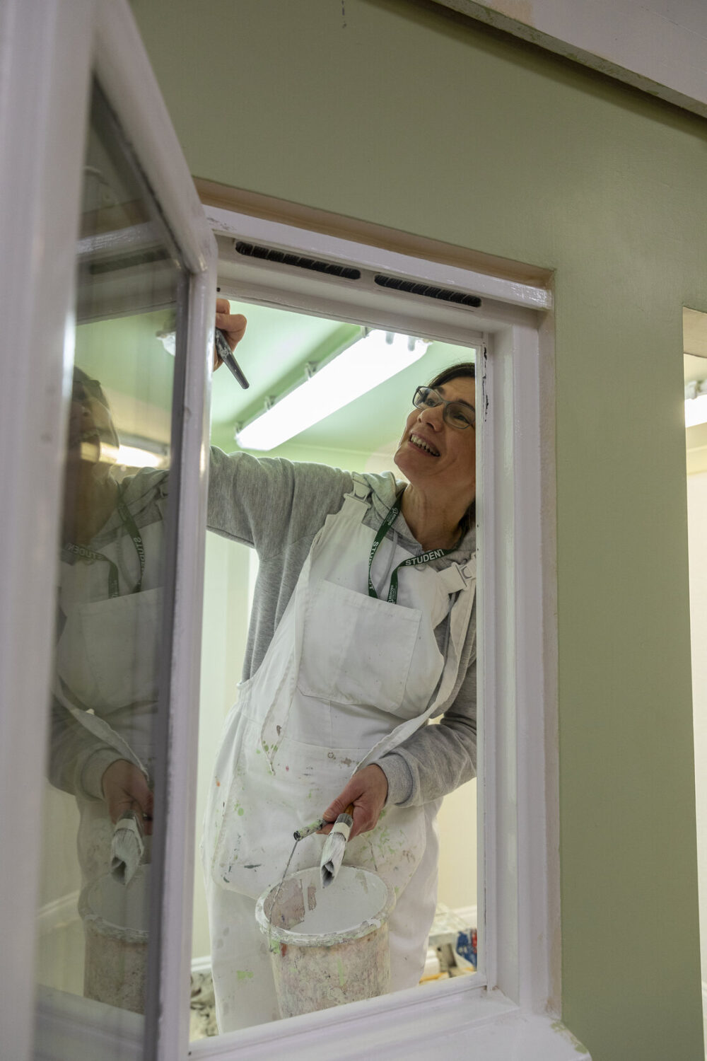 Female painting and Decorating Bedford College student